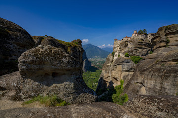 Naklejka premium Meteora Beautiful Stone shapes and Mountains with Monastery on them in Greece