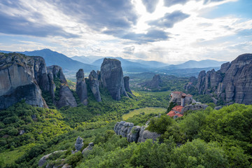 Fototapeta na wymiar Meteora Beautiful Stone shapes and Mountains with Monastery on them in Greece