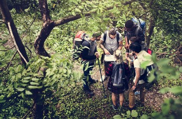 Trekking together in a forest