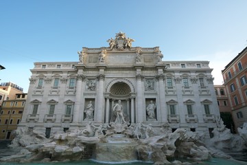 Fototapeta na wymiar Rome,Italy-July 29 2018: Trevi Fountain in the morning, 40 minutes after the sunrise