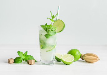 Non-alcoholic cocktail mojito with ingredients for its preparation