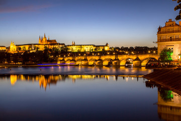 Prague castle and the Charles bridge at dusk