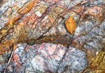 Colorful and patterned surface of the stone.