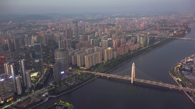 Guangzhou skyline with the Pearl River at dusk. Guangdong, China