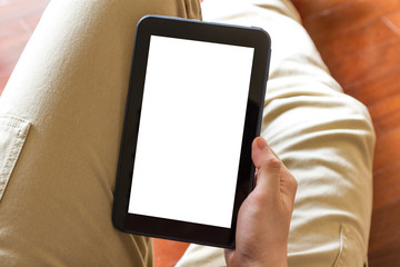 man using tablet computer indoor, close up