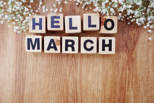 march alphabet letters on wooden background