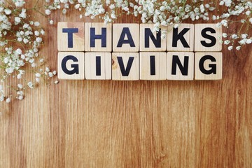 thanksgiving alphabet letters and space copy on wooden background