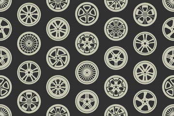 Seamless pattern with car wheels. isolated on black background