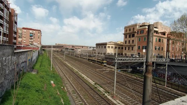 Trains moving in an urban railway, urban industrial landscape