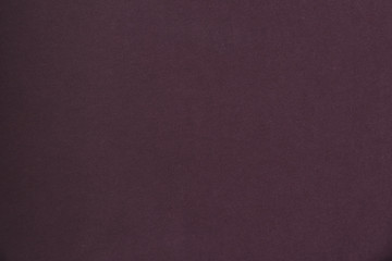 Seamless maroon knit fabric. Solid background