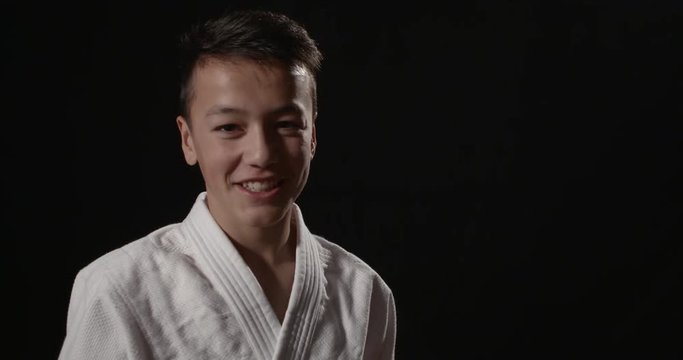 Portrait of a young smiling martial arts athlete