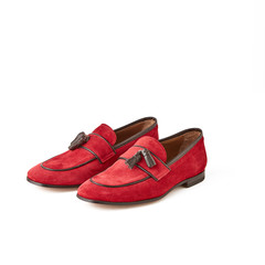 Men's red suede loafers shoes. Studio shot, white background