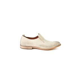 Elegant men's ivory shoe. Studio shot, white background