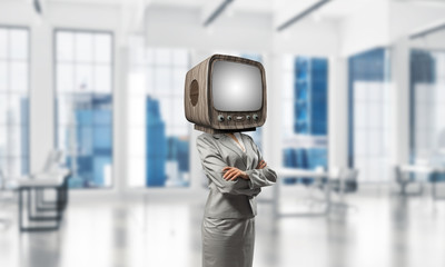 Business woman with old TV instead of head.