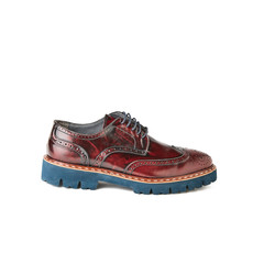 Men's cherry brown brogue shoe with blue sole. Studio shot, white background