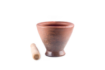 baked clay mortar and wood pestle on white background  cooking kitchenware object isolated
