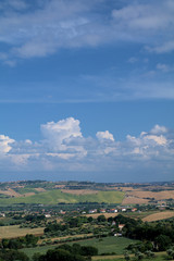 crops,countryside,italy,landscape,hill,agriculture,panorama,field,view,clouds,rural,summer