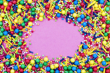 Colourful candy cake decorative sprinkles background