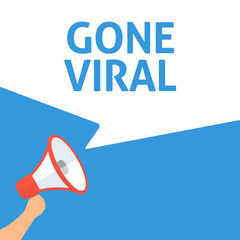 Hand Holding Megaphone With GONE VIRAL Announcement