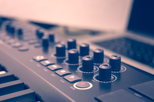 Play buttons on dj controller, vintage filter soft focus