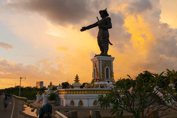 Chao Anouvong Statue in Vientiane, Laos, at sunset