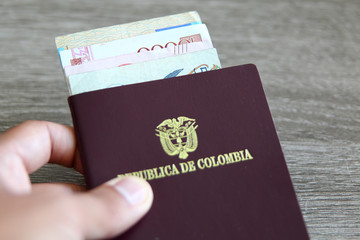 Colombian passport with bank notes