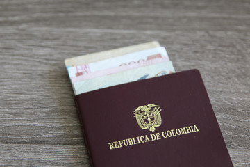 Colombian passport with bank notes