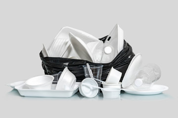 Group of Products made of plastic and foam in garbage bags