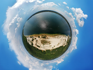 Aerial view of Pogoria Lake, Poland. Planet Panorama 360 Degrees. Water, sand, trees, sky, clouds....