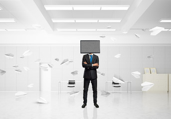 Businessman with TV instead of head.