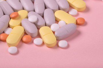 Obraz na płótnie Canvas pills tablets round and oval multicolored