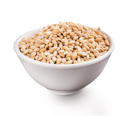 Wheat grains in bowl on white background
