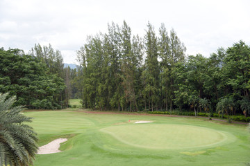 Fototapeta premium Golf course in the countryside. Playing golf on a golf course.