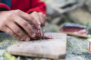 bacon on wood plate on a mountain in south tyrol