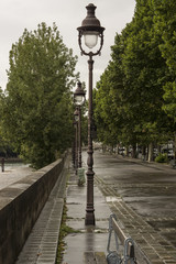 Fototapeta na wymiar Lamp post on street in paris