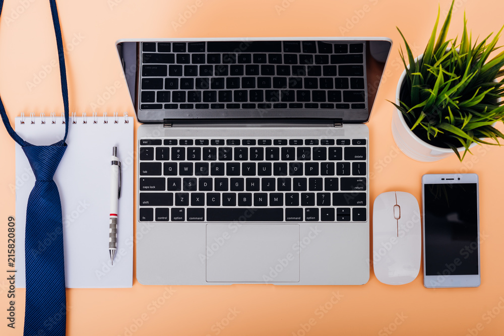 Poster Mock up top view laptop notebook computer have  necktie and smartphone
