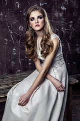 Obraz premium Portrait of young woman in luxury wedding dress