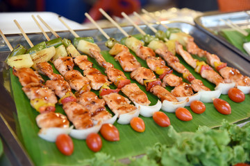 Barbecue on sticks are grilling. Barbeque on the grill.