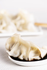 asian jiaozi or gyoza and soy sauce.