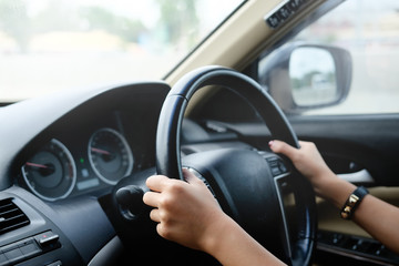 Female driving car. Vintage filter