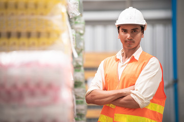 Young warehouse operator portrait.