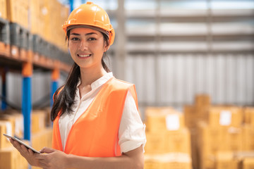 Young warehouse operator portrait.