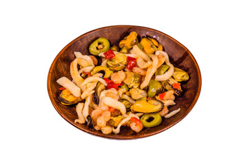 Ceramic plate with the different sea food and olives isolated on white background