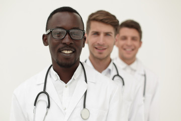 Fototapeta premium group of multi-racial doctors standing in a row