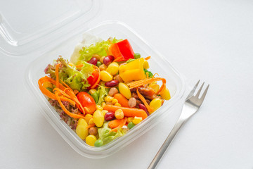 Mix salad in opened plastic box