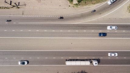 Top down aerial view of transportation highway overpass, ringway, roundabout © Quatrox Production