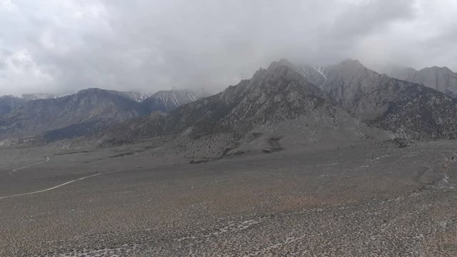 Mt Whitney Stormy Clouds above Sierra Nevada Mountains California USA Aerial Shot