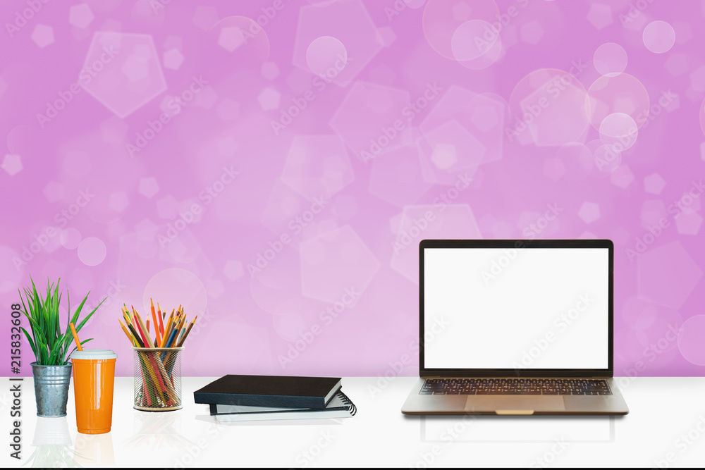 Poster mock up : workspace with blank white desktop computer, pencils and stationery items. blank screen fo