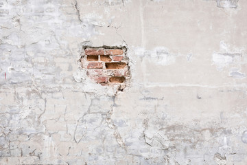 Obraz premium Damaged grey concrete wall exterior background texture