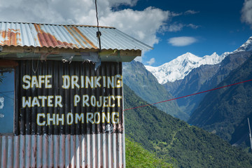 Safe drinking water sign at Chhomorong in the seen trekking in the Himalayas of Annapurna, Nepal.